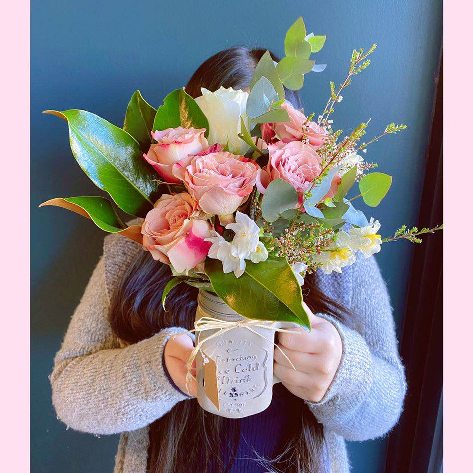 Roses in Milk Jar